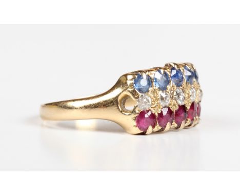 A gold ring, mounted with a row of five cushion cut diamonds between a row of five cushion rubies and a row of five cushion c