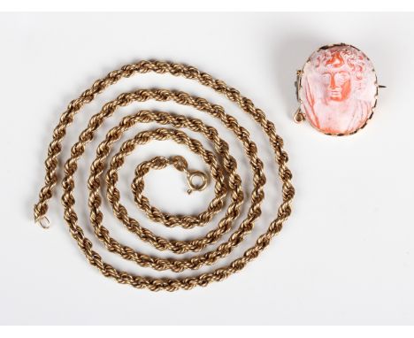A 9ct gold ropetwist neckchain on a boltring clasp, weight 5g, length 53cm, and a coral cameo oval brooch, carved as a portra