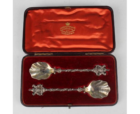 A pair of late Victorian The Salters Company silver spoons, each cast finial formed as the company's arms and inscribed 'May 