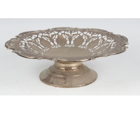 A sterling silver tazza with pierced decoration within a floral and scroll rim, on a pedestal foot, weight 224.8g, diameter 2