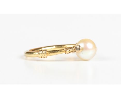 A gold ring, mounted with a single cultured pearl, unmarked, weight 2g, ring size approx I.Buyer’s Premium 29.4% (including V