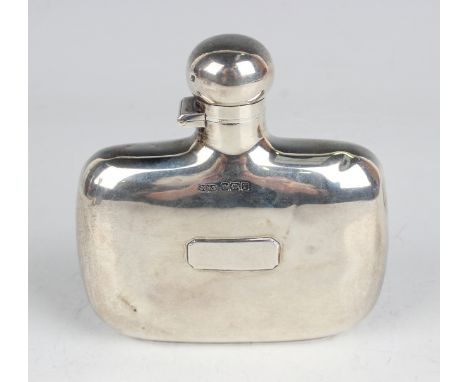 An Edwardian silver hip flask of curved oblong form with screw hinged lid, Sheffield 1909 by James Dixon &amp; Sons, weight 1