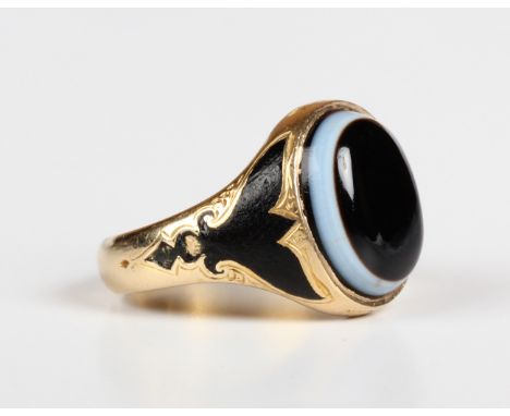 A Victorian 18ct gold, banded agate and black enamelled mourning ring, mounted with the oval banded agate between black ename