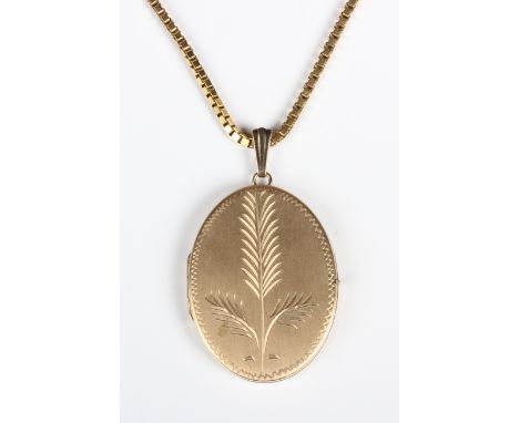 A 9ct gold oval pendant locket, engraved with a fern spray, length 5.3cm, on a gold box link neckchain, detailed '9K', with a