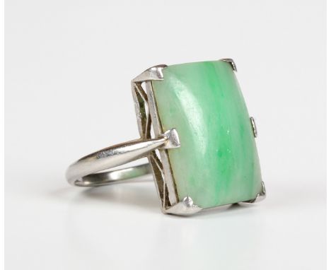 A platinum ring, 1920s, mounted with a rectangular jade, detailed 'Platinum', weight 4.9g, ring size approx L, with a case.Bu