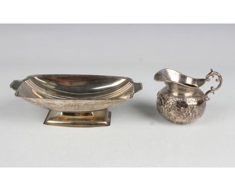 A George VI silver rectangular dish with tab handles, raised on a rectangular foot, Birmingham 1937 by Mappin &amp; Webb, wei