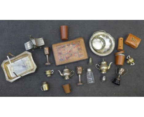 A collection of leather items including a jewellery case with horse decoration, etc., and a collection of silver plated items