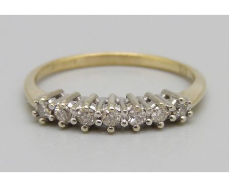 A 9ct gold, seven stone diamond ring, 1.4g, N 