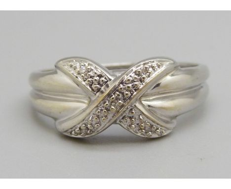 A 9ct white gold and diamond crossover ring, 2.8g, T 