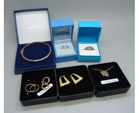 Four pairs of yellow metal earrings and a pendant and chain, 3.3g, (two pairs of earrings and the chain marked 375), a silver