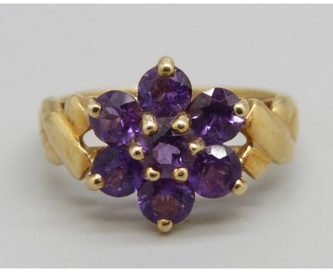 A 9ct gold and purple stone ring, 2.4g, M 