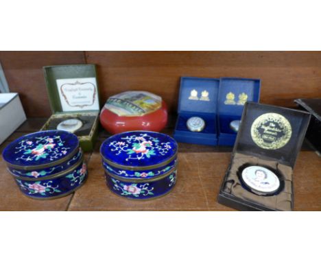 A Royal Crown Derby trinket box with hand painted lid, a pair of enamelled trinket boxes and four commemorative boxes 