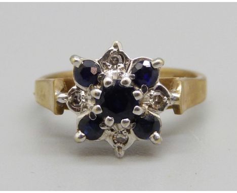 A 9ct gold, diamond and sapphire ring, 2.6g, G/H 