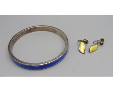 A silver and enamel bangle and a pair of Norwegian silver and enamelled earrings, chip on the bangle 