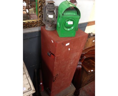 A RED METAL TRUNK AND OTHER OBJECTS INC GNOME, LAMPS, OLD PUMPS