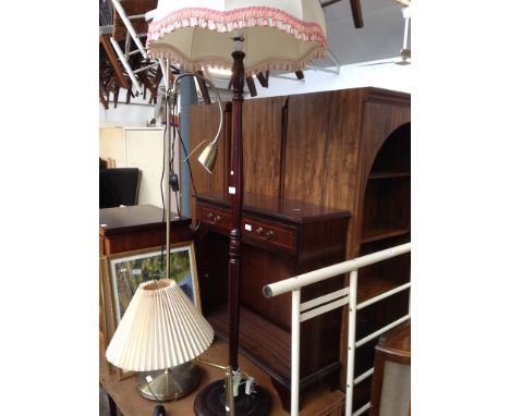 A STANDARD LAMP AND A MODERN UPLIGHTER