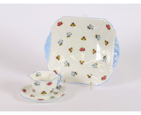 A Shelley tea set, having floral spray decoration