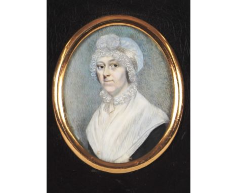 19th Century school, oval portrait miniature of a lady wearing lace trimmed bonnet, contained in an ebonised and brass mounte