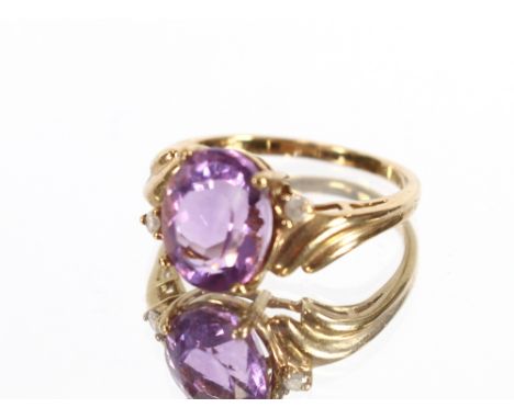 A 9 carat gold and amethyst set ring