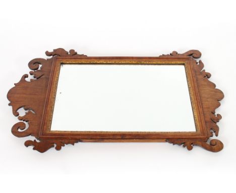 A mahogany fret carved Chippendale style wall mirror, 73cm
