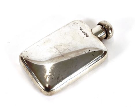 A late Victorian silver hip flask, with hinged lid, London 1900