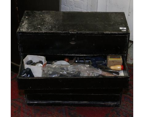 A work chest of drawers and contents of tools.