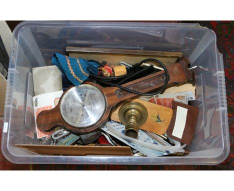 A box of miscellaneous collectables oak barometer, umbrella, brass candlestick etc.