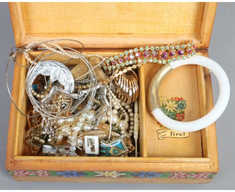 A Swiss musical jewellery box and contents including simulated pearls and hardstone bangle etc.