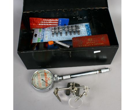 A box of assorted tools along with a compression gauge etc