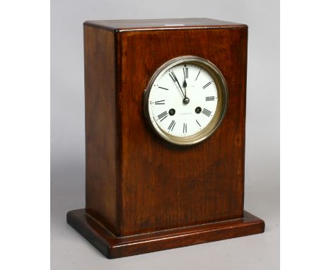 A mahogany cased eight day mantle clock housing a French movement