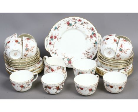 A Minton bone china tea service decorated in the Ancestral design, 39 pieces.