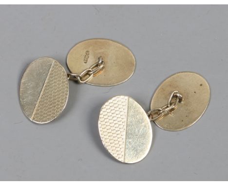 A pair of gents 9ct gold oval cufflinks with engine turned engraving, 3.47 grams.