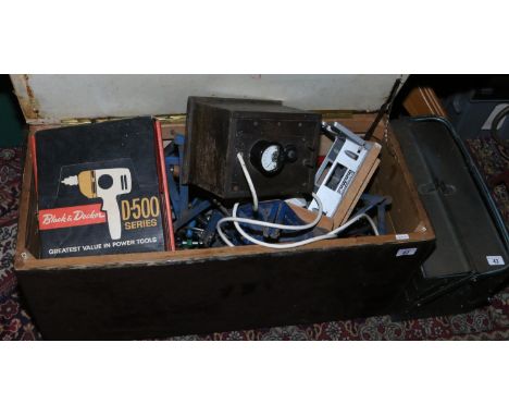 A box and a tool box containing a large quantity of tools.