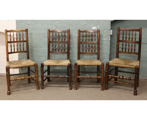 A set of six plus two turned spindle back rush seat dining chairs originally from Bainton Hall Driffield