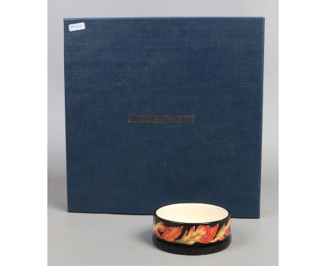 A Moorcroft trinket dish designed by Vicky Lovatt along with Moorcroft box.