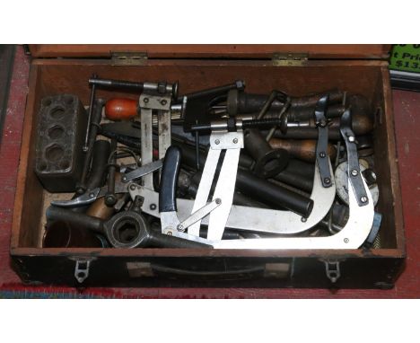 A box of assorted mechanic and engineering tools 