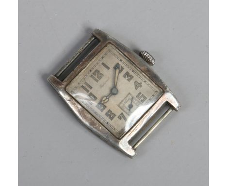 A gentleman's vintage silver cased manual watch head of tank form with rectangular dial signed federal, having blued open han