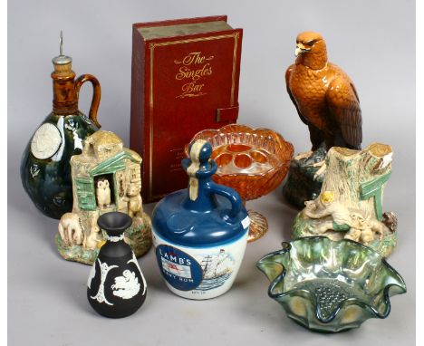 A group of collectables including Winnie the Pooh plaster bookends, a Royal Doulton decanter, unopened Lambs Navy rum adverti