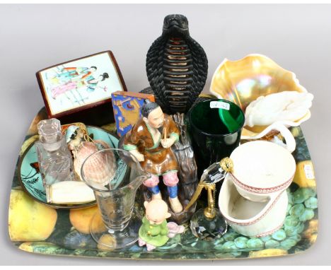 A tray of collectables including oriental figurine, a model of a cobra, a Victorian measuring beaker and shaving mug, abalone