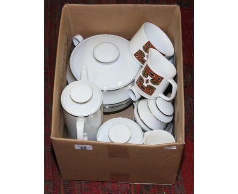 A box of mixed pottery including a German part china tea service with gilt decoration along with Meakin vintage teawares.