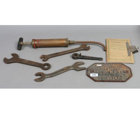 Railway interest; A cast iron wagon plate marked owners Esso Petroleum Company Ltd number 610, four LMS spanners, grease gun 