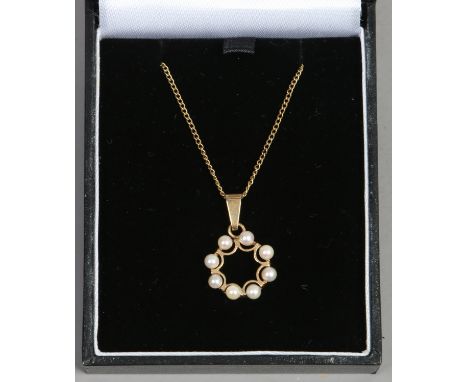 A 9 carat gold cultured pearl ring pendant on chain.