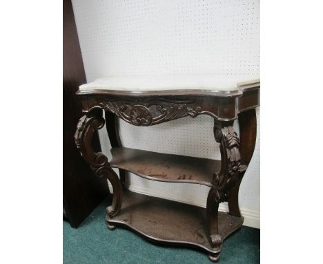 A CONTINENTAL MAHOGANY SIDE TABLE of serpentine outline surmounted with white vein marble top above two open shelves joined b