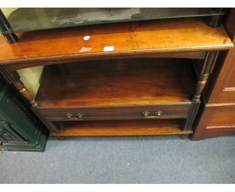 AN EDWARDIAN MAHOGANY THREE TIER DUMB WAITER the rectangular moulded top above an open shelf with frieze drawer on turned leg