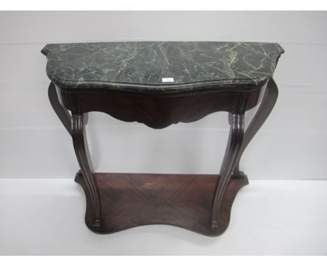 A CONTINENTAL KINGWOOD AND MARBLE TOP CONSOLE TABLE of serpentine outline the shaped moulded top with green vein marble top a