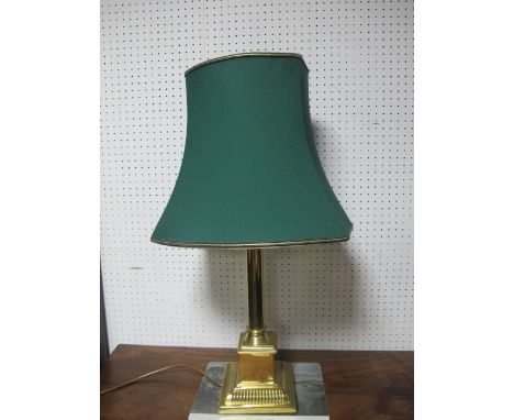 A BRASS CORINTHIAN COLUMN TABLE LAMP raised on a square stepped base with shade 72cm high