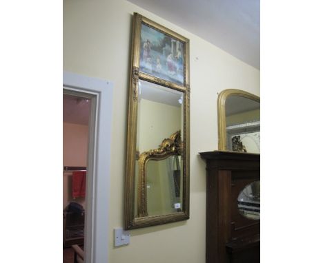 A CONTINENTAL GILTWOOD AND GESSO TRUMEAU MIRROR the rectangular reeded frame with bevelled glass plate headed with a coloured