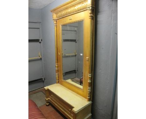 A CONTINENTAL GILTWOOD AND GESSO CONSOLE TABLE AND MIRROR the rectangular plate within a moulded frame between cylindrical an