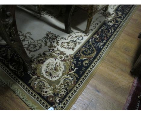 A WOOL RUG the beige, light brown and dark blue ground with central floral panel within a conforming border 295cm x 200cm