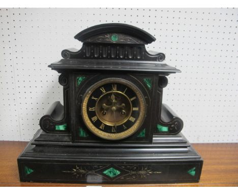 A VICTORIAN BLACK SLATE AND MALACHITE INLAID MANTLE CLOCK of architectural form with circular dial and Roman numerals raised 